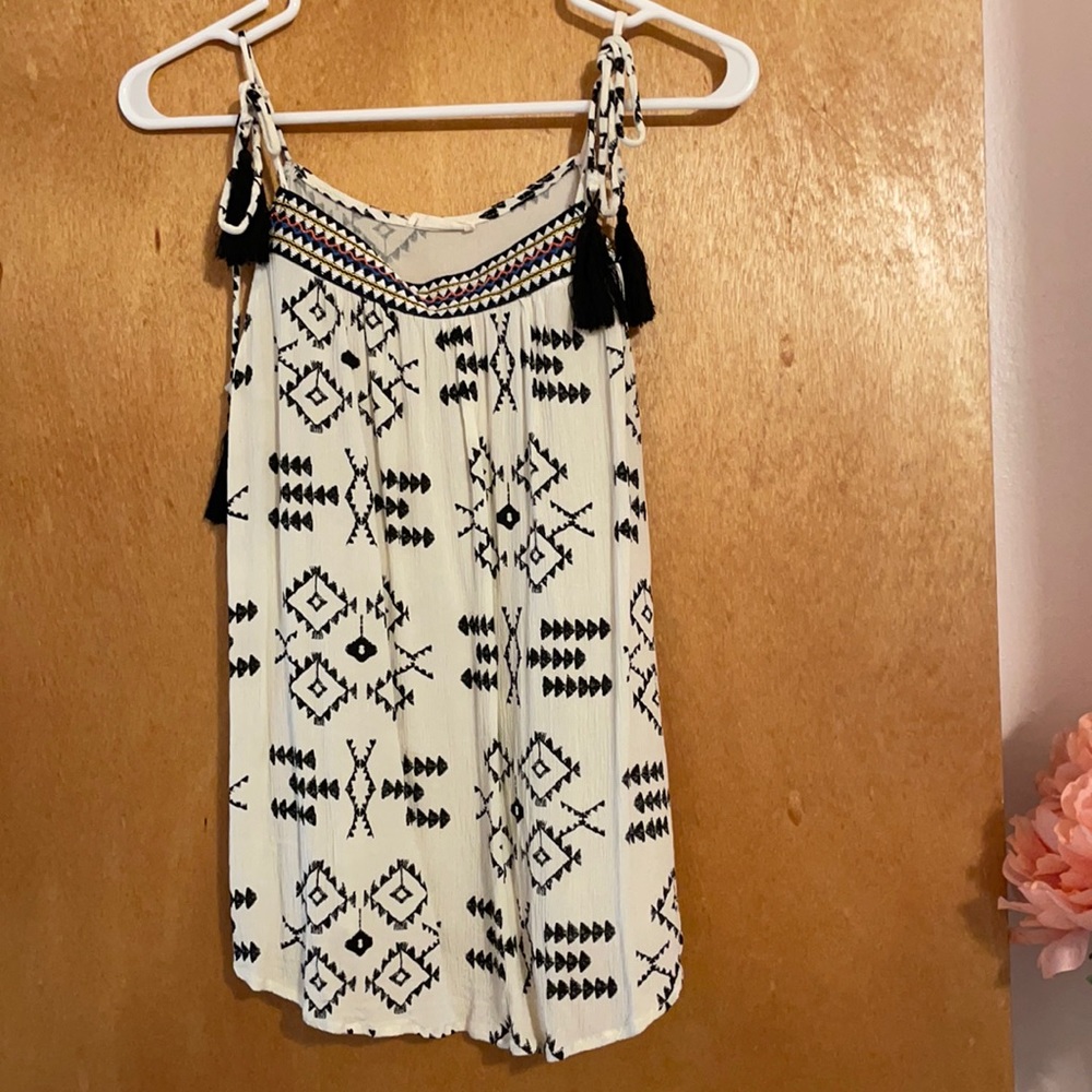 Jella C. Medium spaghetti strap top.